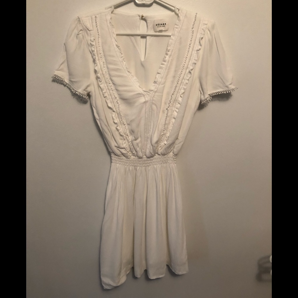 Sezane white dress with ruffle detailing!